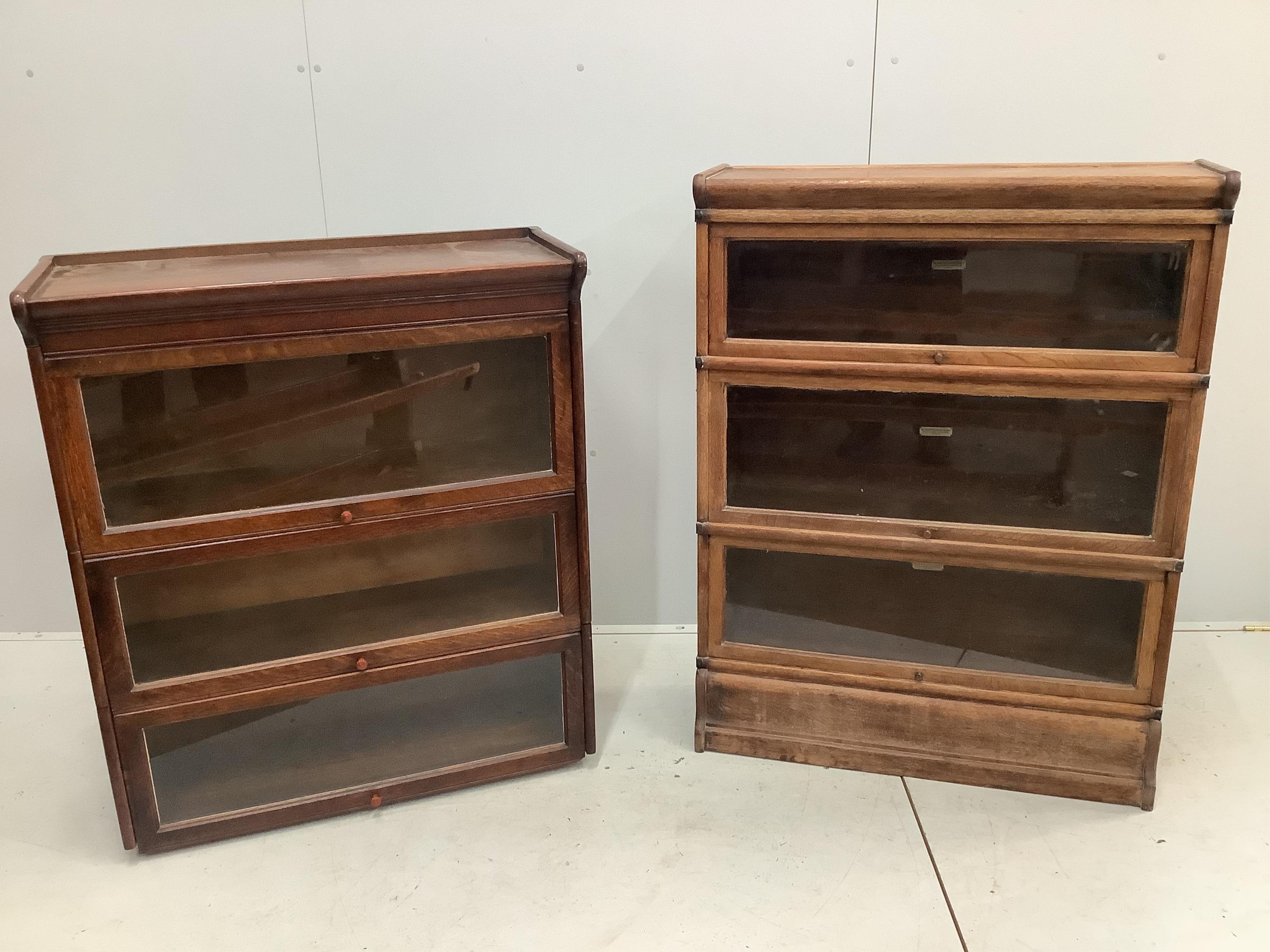 A Globe Wernicke three section oak bookcase, width 87cm, height 115cm and another similar un-named bookcase, width 87cm, height 103cm. Condition - Globe Wernicke a little faded, otherwise fair, other has lost its plinth